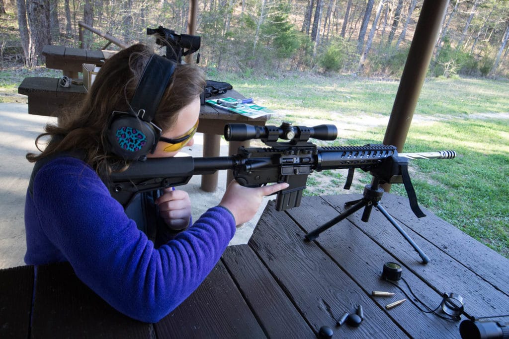 Student practices with an AR-15 Rifle
